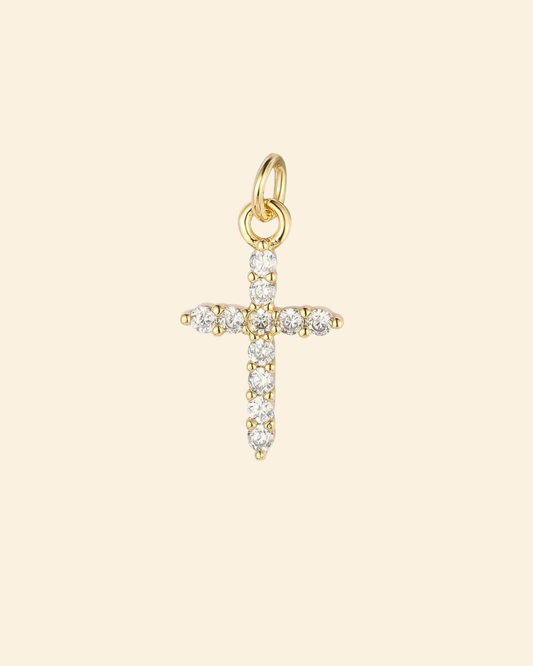 Zircon cross charm